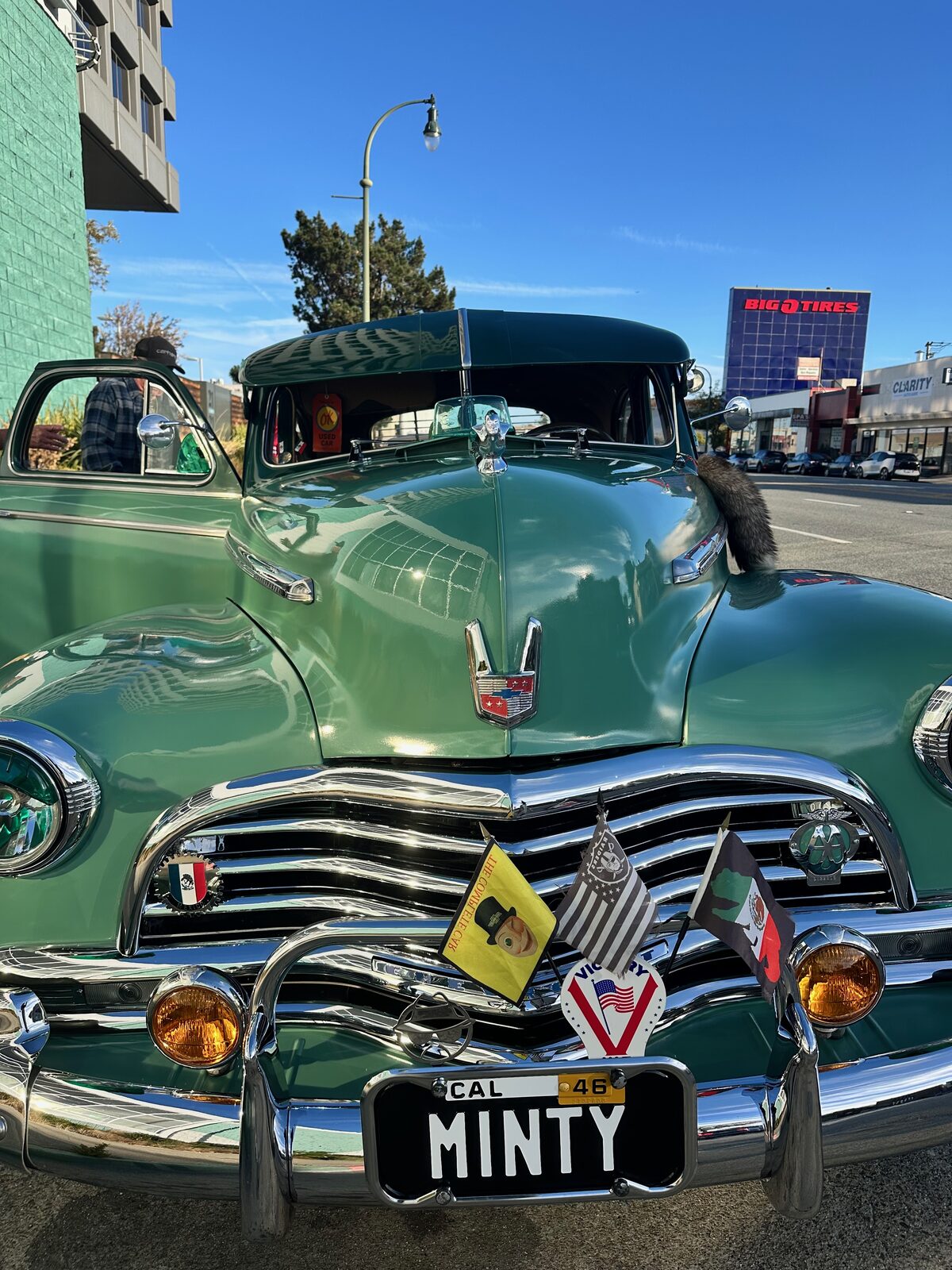 A mint green 1946 Chevrolet with a license plate reading MINTY